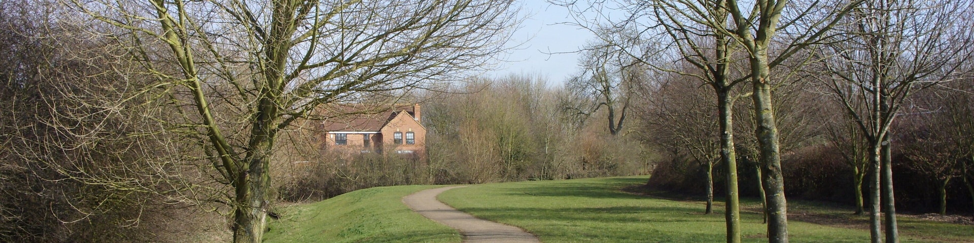 Footpath towards the Wavendon bridlepath Running parallel with the small stream the path runs between Rackstraw Grove and Handel Mead.