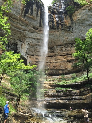 Hemmed-in Hollow is one of the beautiful waterfalls located in the Buffalo River Wilderness Area.
This towering waterfall is best accessed from the river. The trail is located between Steele Creek and Kyle's Landing, both popular camp areas and river access points along the Buffalo National River. I don't think the trail is marked, but it's not a secret and there are usually plenty of people who can guide you on where to stop. It's about a 1.5 mile trip each way with a little elevation gain...but not a difficult hike.
You can reach Hemmed-in Hollow over land, but that is a more strenuous hike.