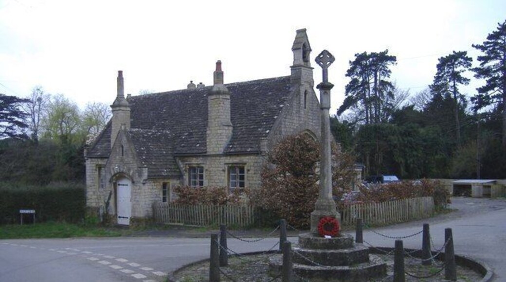 War memorial, Stinchcombe With the 'Old School House' in the background.