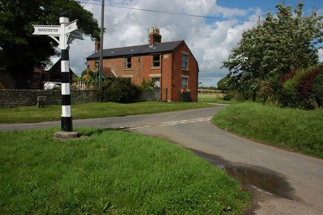 Road junction, Ashleworth A road junction in Ashleworth with an interesting road sign.