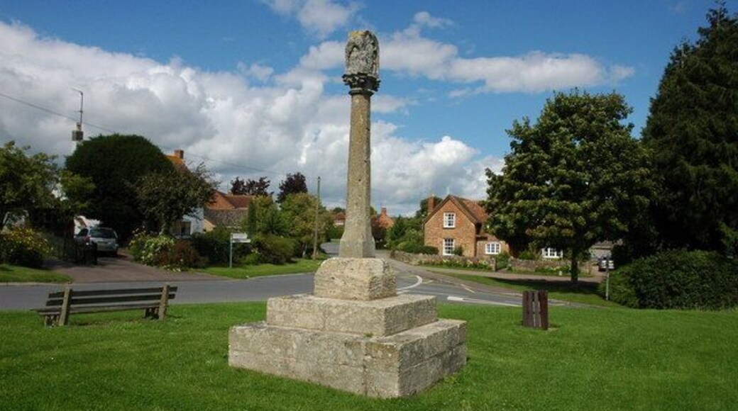 Cross in Ashleworth This 14th century cross was moved to its present position on the small green in 1970, between 1886, when it was restored, and this date it was sited in the churchyard.
