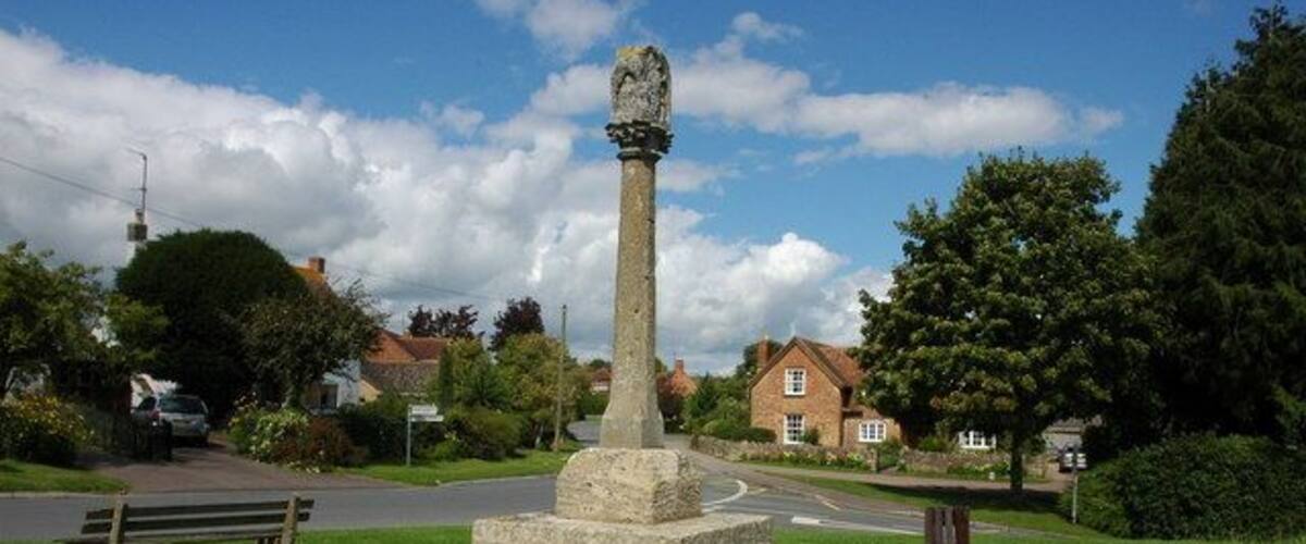 Cross in Ashleworth This 14th century cross was moved to its present position on the small green in 1970, between 1886, when it was restored, and this date it was sited in the churchyard.