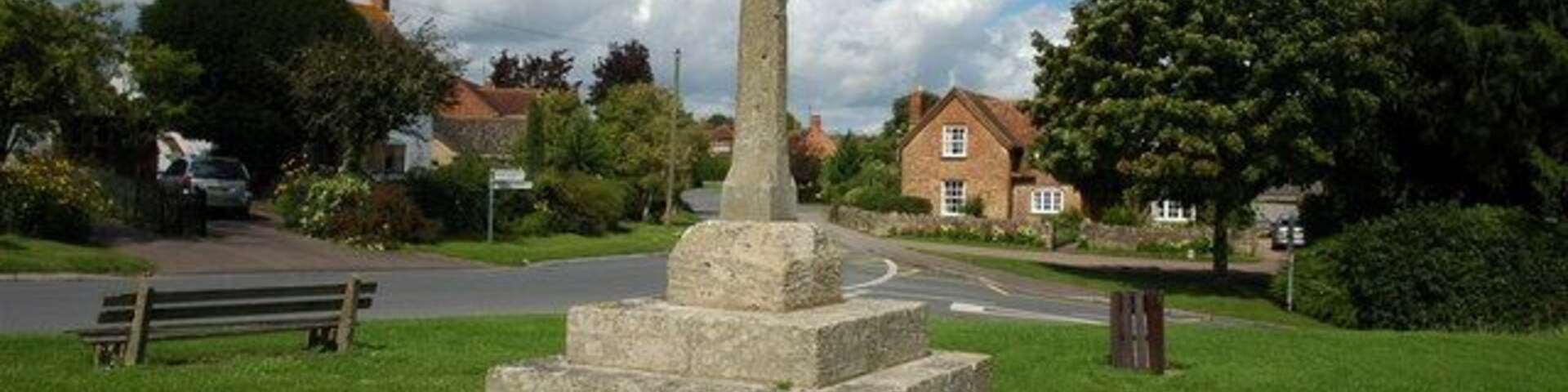 Cross in Ashleworth This 14th century cross was moved to its present position on the small green in 1970, between 1886, when it was restored, and this date it was sited in the churchyard.