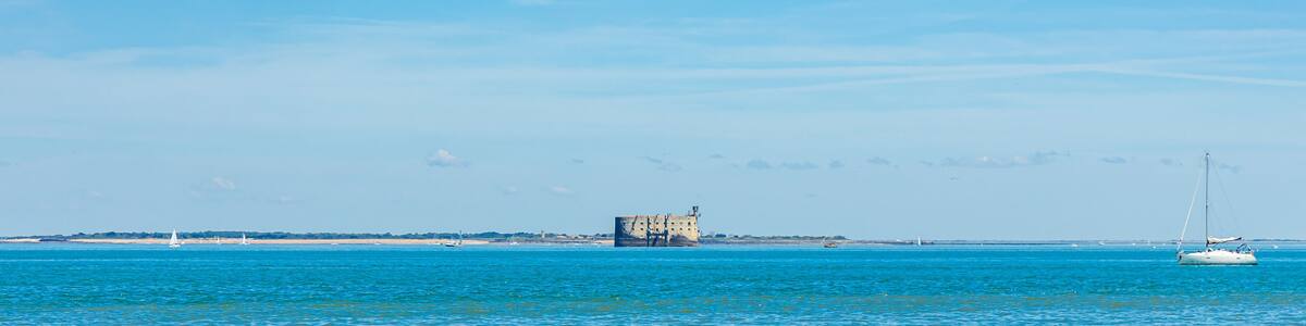 Fort boyard seen from Boyardville beach on a sunny day in Charente-Maritime, France