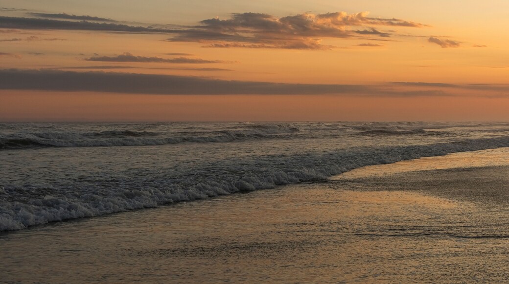 Orange and golden sunset sky calmness tranquil relaxing sunlight summer mood. , Jaguaruna Beach, Santa Catarina , Brazil