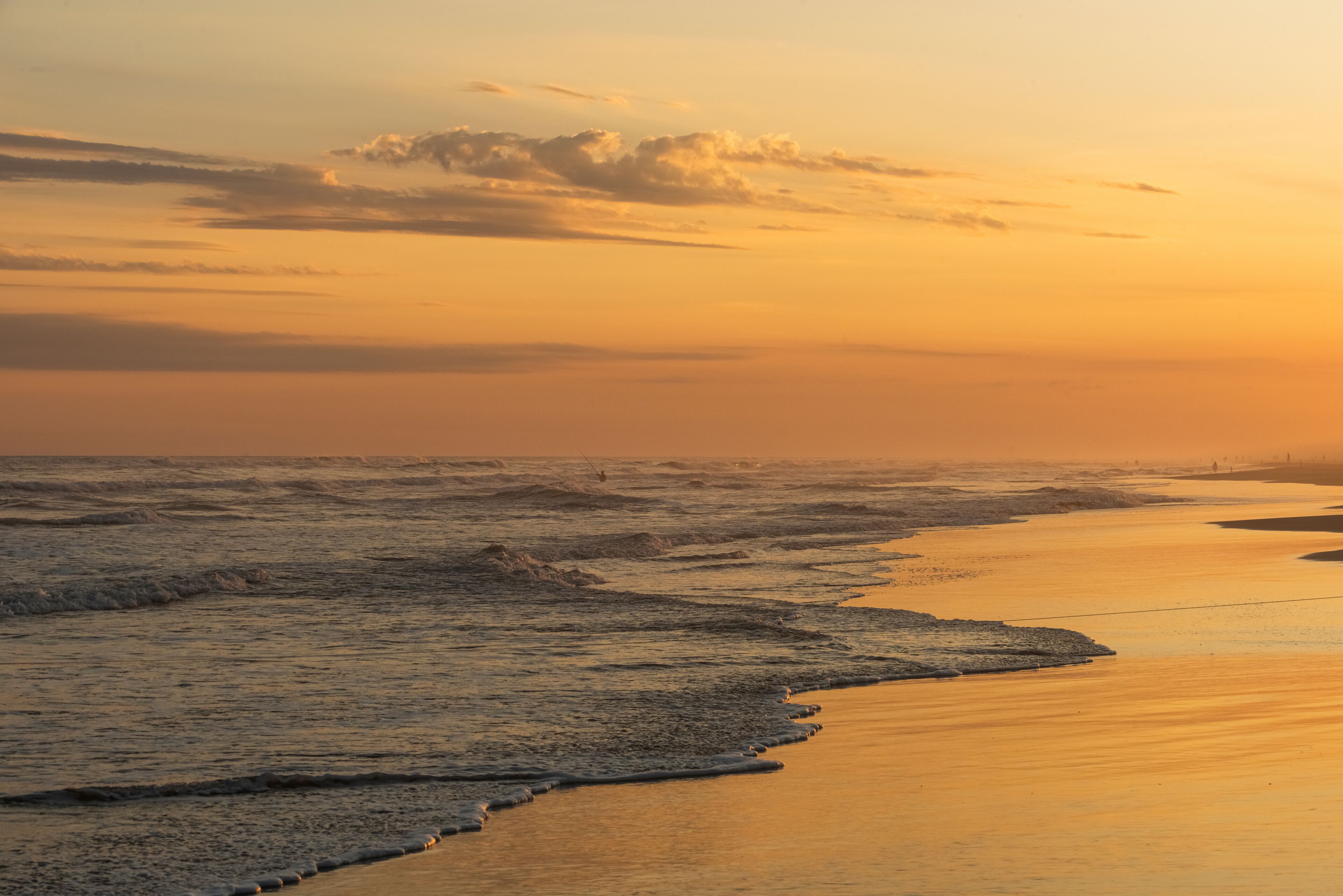Orange and golden sunset sky calmness tranquil relaxing sunlight summer mood. , Jaguaruna Beach, Santa Catarina , Brazil