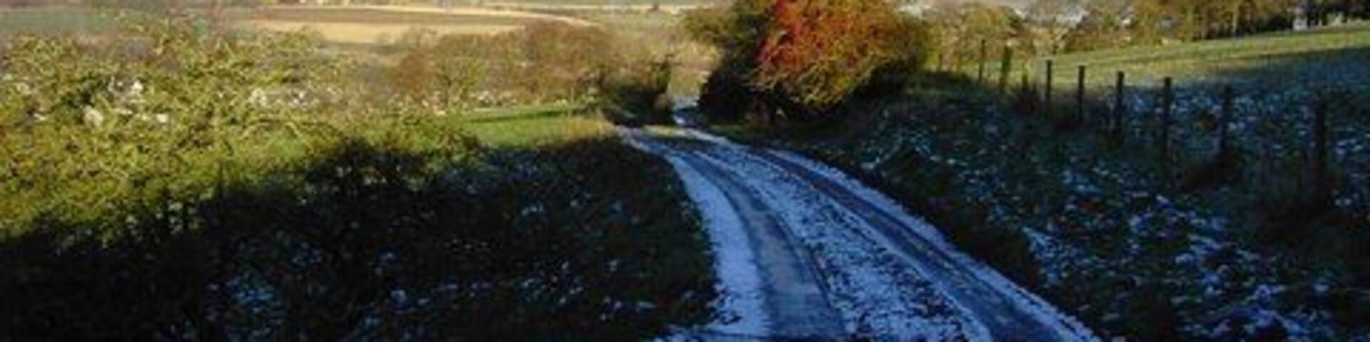 Icy Track to Abernethy This trail heads downhill to Abernethy, passing Gattaway Farm on route.