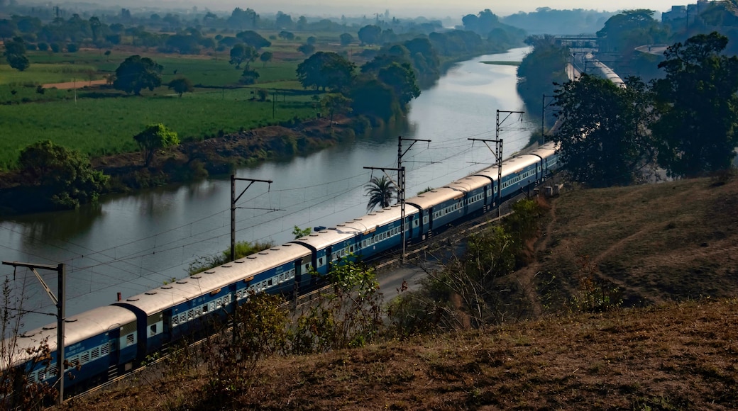 A passenger train amidst greenery at Kamshet near Pune India.