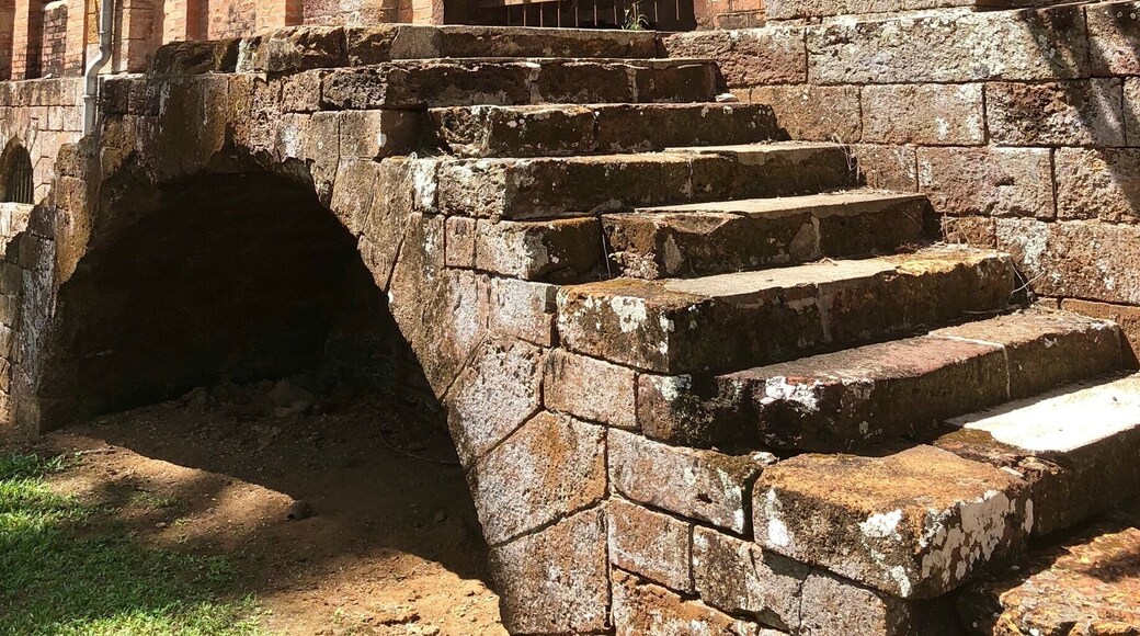 Dating to 1870, this was the prisons hospital. Here’s a bit more history:
In the late 1840’s France had a problem with overpopulation in its prisons and made the decision to transport some of the prison population to the Iles du Salat (Salvation Islands). This particular set of islands is about 6 miles off of the coast of French Guiana and made up of Ile Royale, Ile Saint-Joseph and Ile du Diable. The French also installed prisons on the mainland of French Guiana as well as other islands located north of here. The prison was run on the Salvation Islands from 1852 until 1946. A law was passed by the French Government in 1853 that required convicts to stay in French Guiana following their release for a time equal to their sentence ... or, for sentences exceeding eight years, for the remainder of their life’s! So, incarceration here really was a life sentence with no ability to return to mainland France! Interestingly, the islands are still part of France and the EU as is mainland French Guiana.