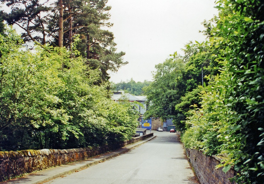 Approach to site of Auchendinny station, 2000. The station, closed 5/3/51, had been on the ex-NBR (Edinburgh) - Bonnyrigg - Penicuick branch, which lost its passenger service from 10/9/51 but remained open for goods until 27/3/67. A factory has been built on the site.