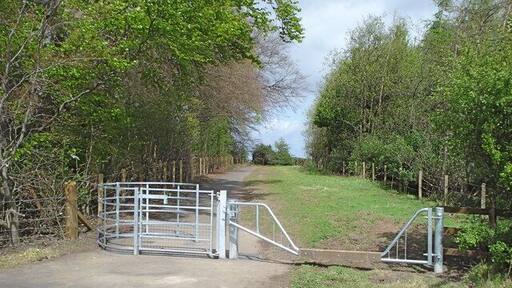 Entrance Gates to The Moat Site, Roslin This kissing gate, large enough for use by wheel chairs, and gate providing easy access for horse riders, erected at the end of April 2009 gives access to the developing network of paths and bridle ways on the site of the old Moat Colliery and brickworks.