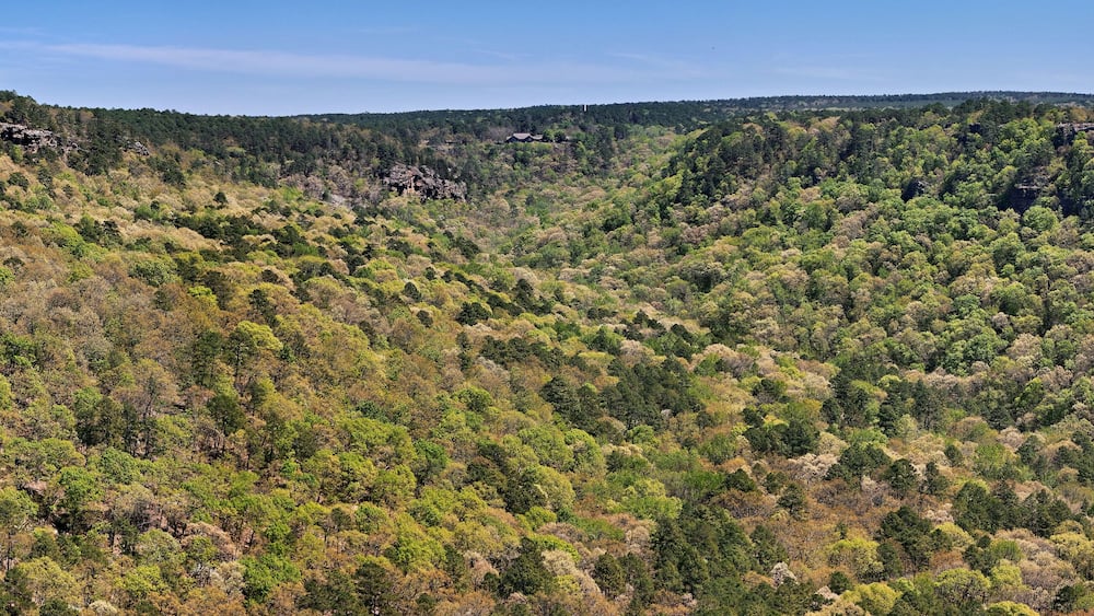 Panoramic view of Petit Jean State Park in Arkansas looking East up the valley toward the Mather Lodge in the distance