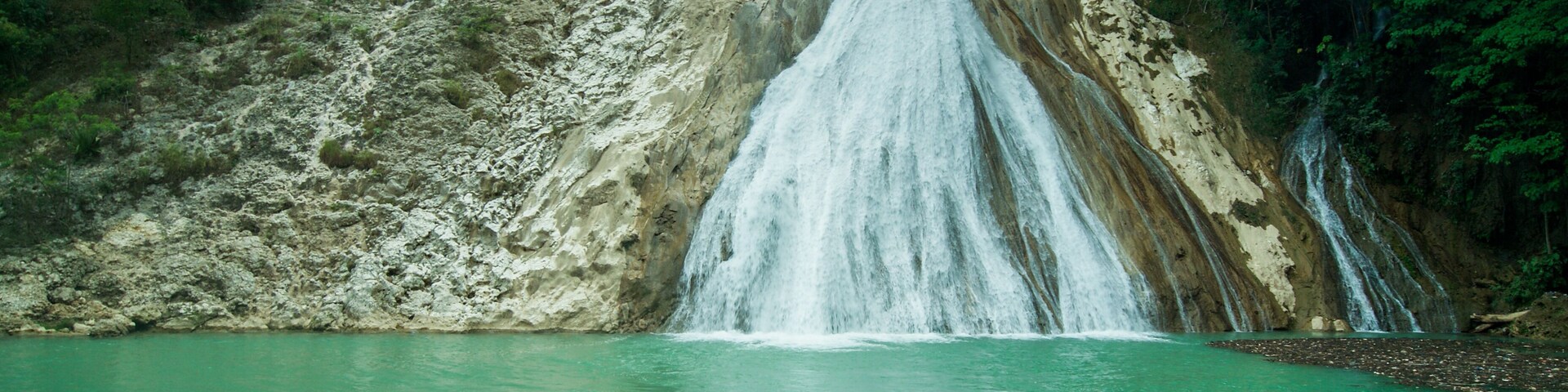 Bassin Zim, Haiti (Hinche) waterfall on a lake