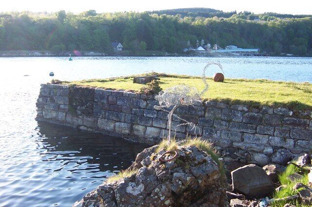 The Old Jetty The old jetty is opposite the Lochaline main pier, just inside the entrance of Loch Aline. In the distance you can see evidence of the white silica sand, underground, quarry workings.