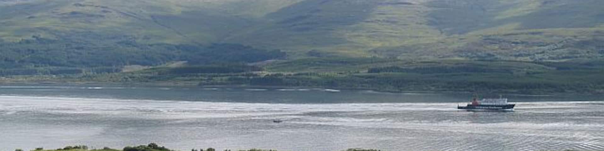 Sound of Mull Ferry to Coll and Tiree passes Dun da Gaoithe. View from the Lochaline -Drimmin road.