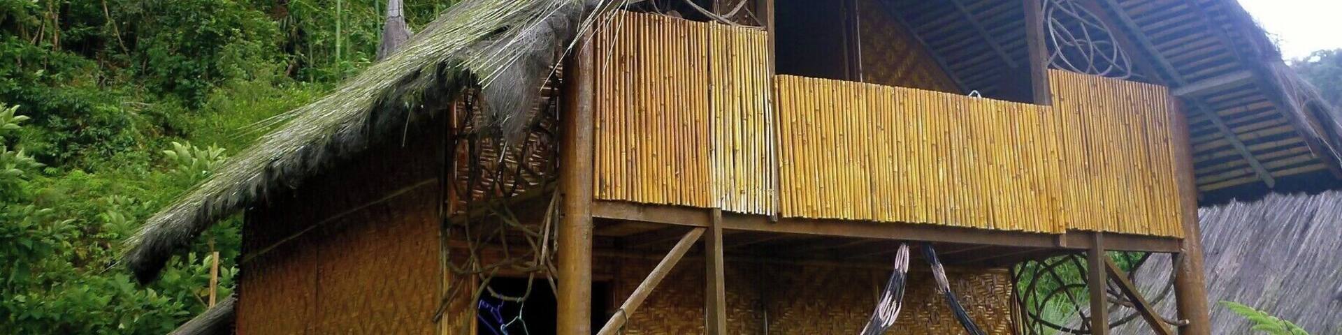 Harau Valley, Sumatra, Indonesia
We stayed at Abdi Homestay, one of only three other homestays in the area that we could see. It consists of five bungalows (one attached to kitchen) that in one direction faces a rice field and the other is against a sheer cliff with a waterfall. It’s the perfect setting to sit back in one of their hammocks and relax and read a book.
The bungalows are extremely spacious with a large bed downstairs, a clean washroom with Western toilet and mandi shower and a loft upstairs with another bed and a small patio. There is always a flask of boiling water on your table for all day tea and coffee.
At 120,000 rupiah per night (that's $12 Canadian!) it was a sweet escape.
#indonesia #sumatra #bungalow
http://kileetravels.com/harau-valley