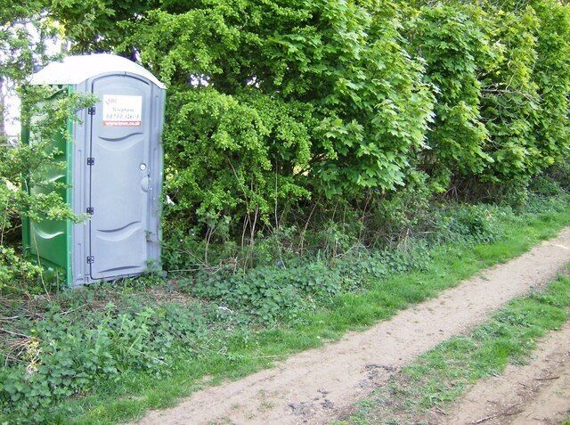 Convenient convenience My male walking companion had just used the natural facilities on the bridleway a few yards back when we discovered this "port-a-loo". It may be there for use by workers on the nearby telecommunications mast; we could not think of any other reason.