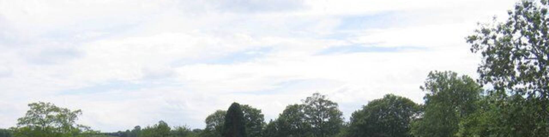 Epwell Mill. Seen across the fields from the bend in the lane to Epwell.