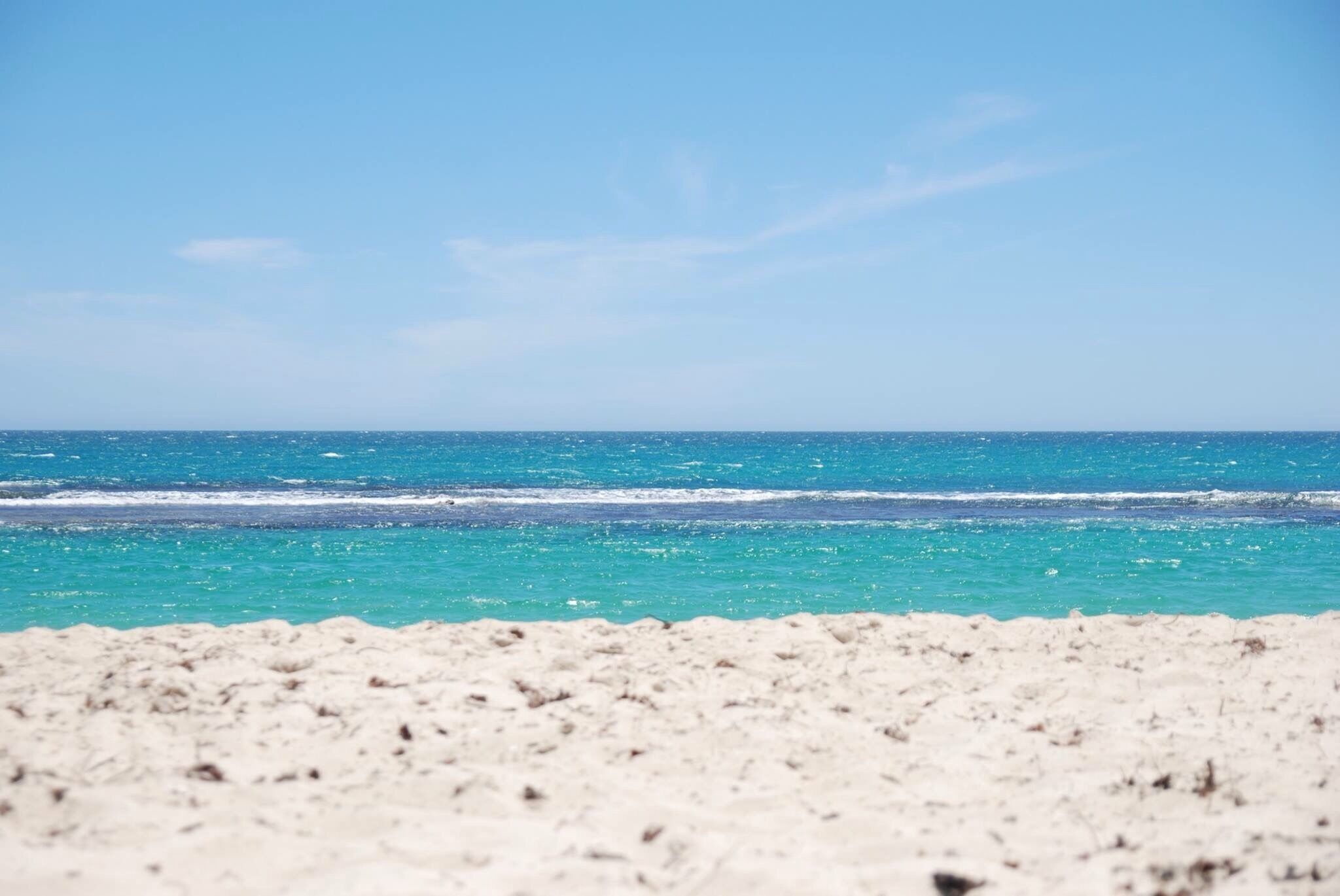 Our stop off in Blue Lagoon, Yanchep on our holiday in Australia. The sea was clear, calm and so blue! Whilst the sand burnt our feet. The beach was endless and wasn't busy. It was beautiful, we swam out to the reef break and returned to a picnic 🍞