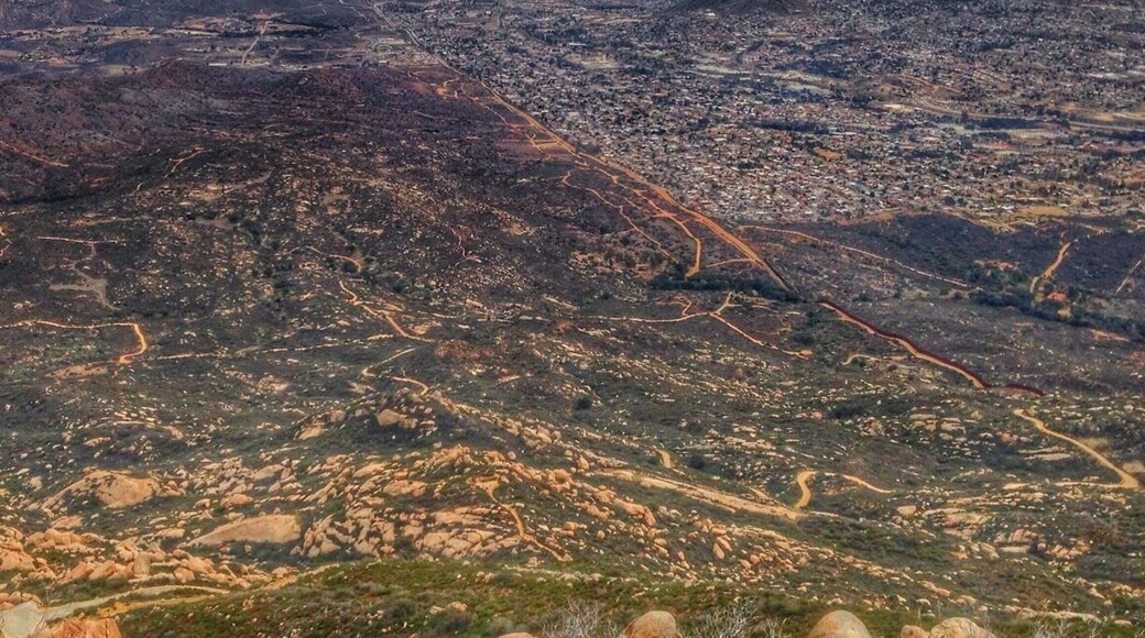 The border from Tecate Peak. The city of Tecate, Mexico is on the right side. The white towers in the center if town is the Tecate Brewery. I'm a fan!