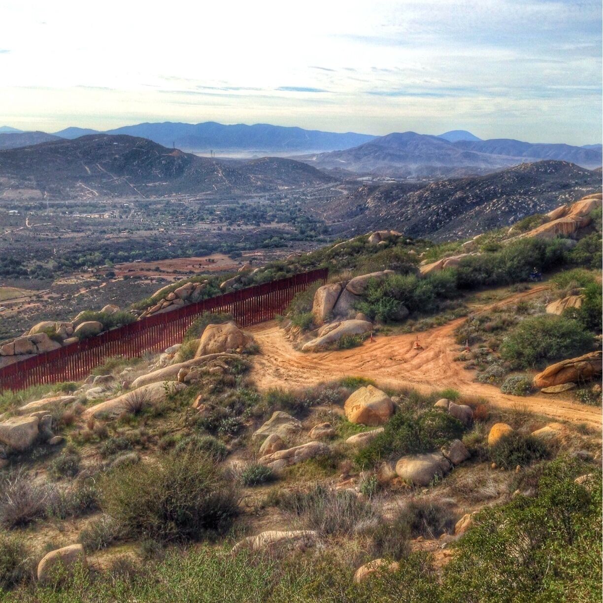 The end of the fence, looking into Mexico. Notice the U.S. Border Patrol agent chilling to the right on his ATV. Tecate Peak is a nice 10ish mile hike with great views. 