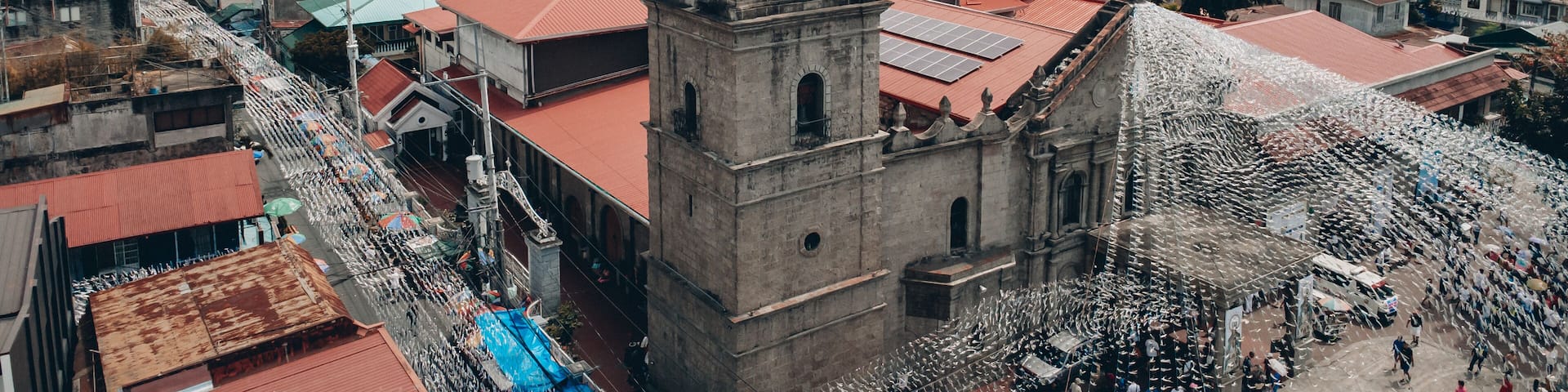 Aerial Drone View of Historic Stone Church in Rural Town of Sta. Maria, Bulacan, Philippines