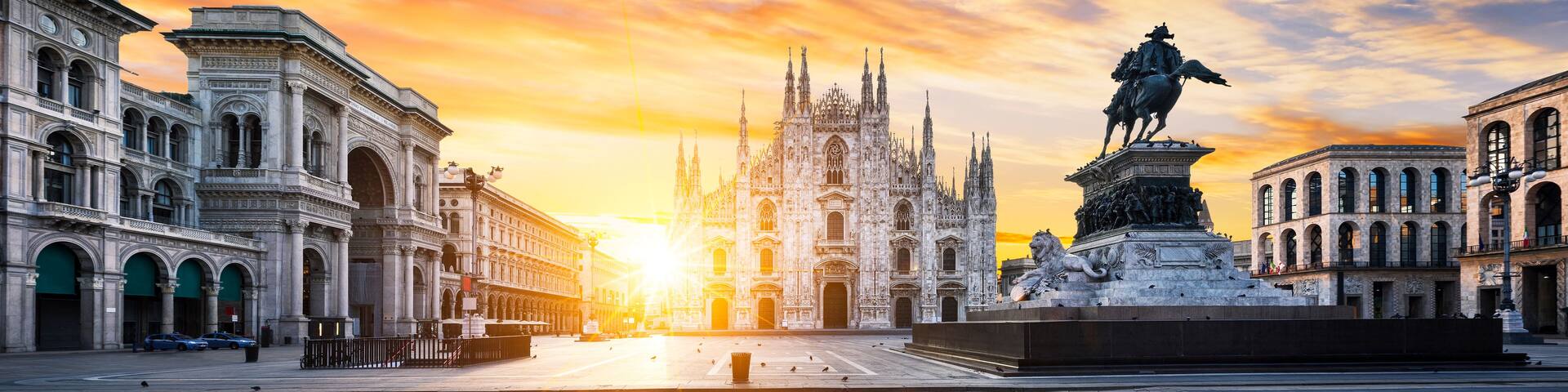 A grand cathedral with intricate Gothic architecture, a statue of a historical figure on horseback, and a bustling square with pedestrians and pigeons.