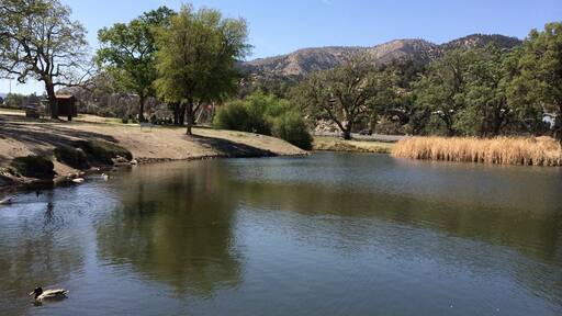 Peaceful lake at small village,
Also snow winter time .