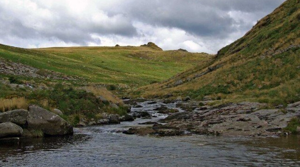 Looking up the river Tavy into Tavy Cleave, Devon The walk as far as this is easy, along the track from Lane End, beside the leat. Just out of sight in the middle is a small locked building and weir - from which the leat water is extracted. From there on the walking gets rougher - but it is a great adventure to go on up the cleave. We swam in the pool from which this picture was taken. (Yes, it was cold...)