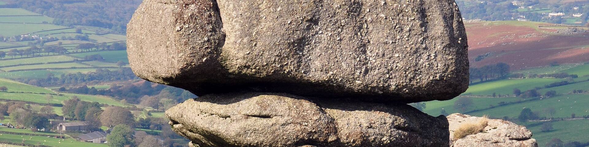 Rock outcropping on the edge of Roos Tor on western Dartmoor. Brent Tor is visible in the background.