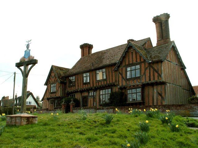 Village sign at Brent Eleigh, Suffolk Standing by the village sign is this wonderful Elizabethan house (Corner Farmhouse), which is timber-framed with brick nogging.