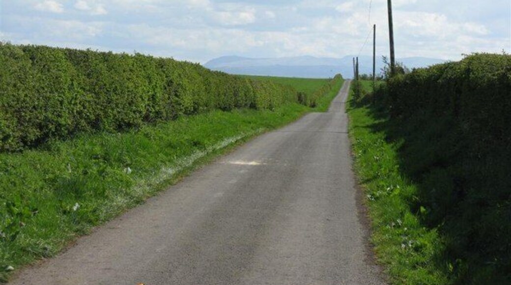 The road to Dornock Brow Keep right on to the end of the road and you could end up at Skiddaw in the Lake District, which is visible in the distance. Just the Solway Firth to negotiate, which would be about 2.5km wide at this point at high tide.
