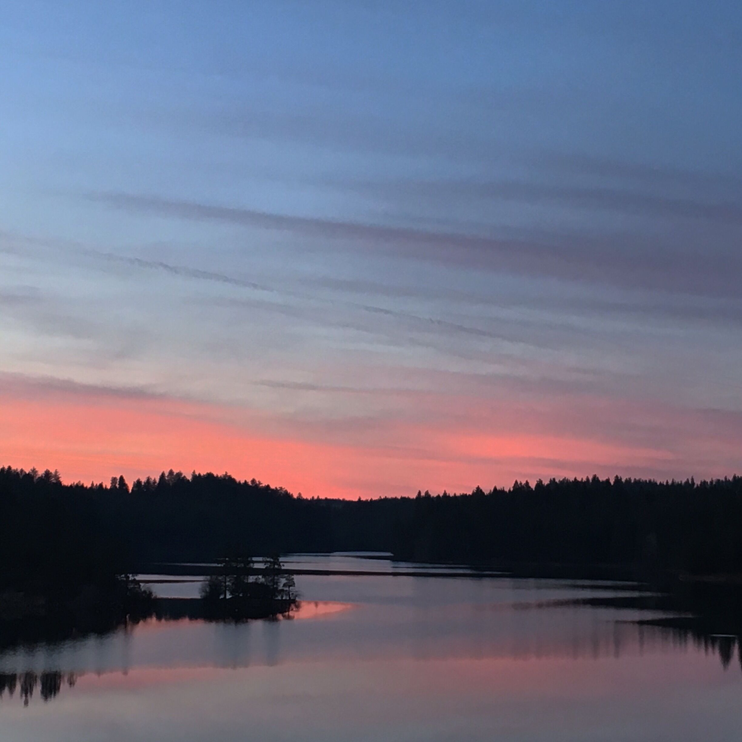 Went for a drive and noticed how the sky was painted with the sunset. Ran to get the shot. 
