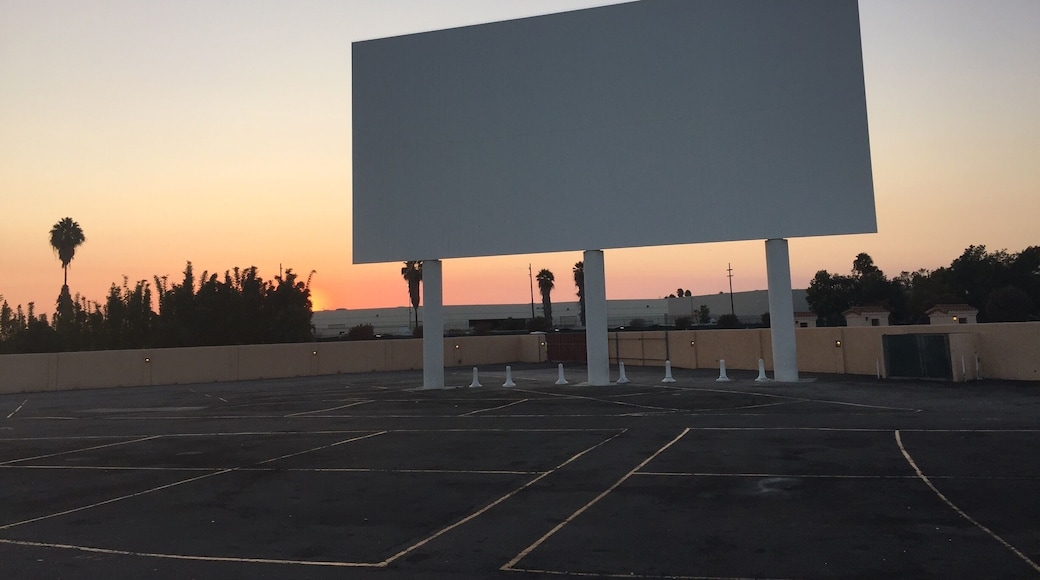 Cool spot to bring the family or hangout with friends and enjoy a 2x1 of Hollywoods latest features they even aloud you to bring you own food and soft drink but the do offer your classic movie snacks paramountdrivein.com