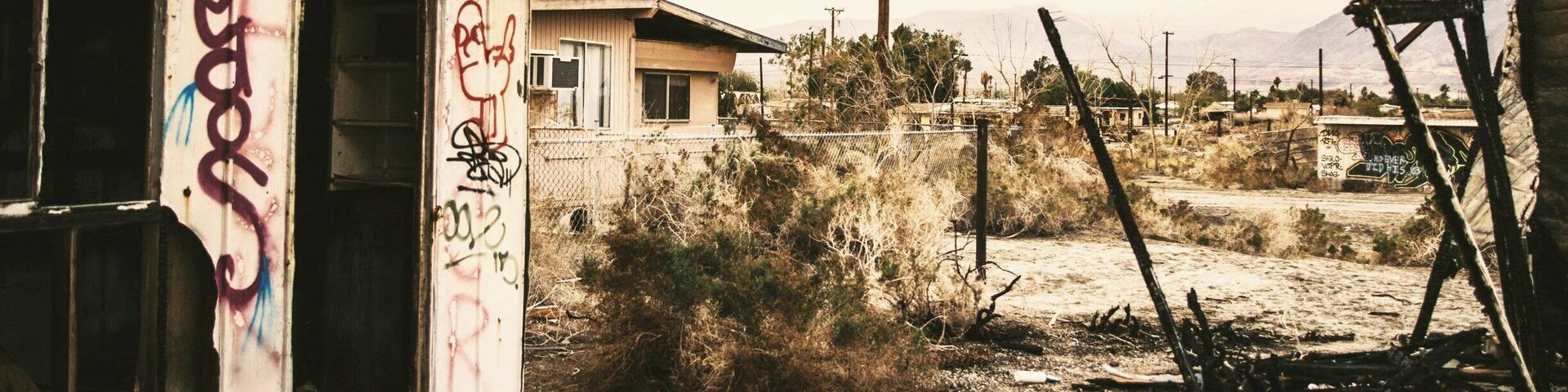 Abandoned - what was once a community is now a ghost town. Situated directly over the San Andreas fault, extreme salinity of the waters around Salton Sea area has forced its residents to abandon their homes.