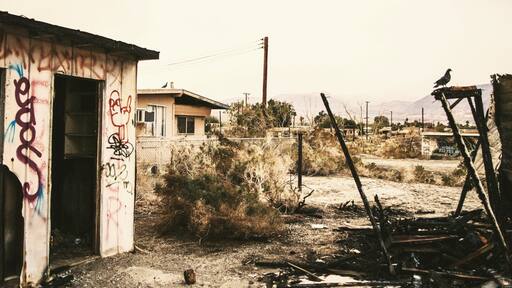 Abandoned - what was once a community is now a ghost town. Situated directly over the San Andreas fault, extreme salinity of the waters around Salton Sea area has forced its residents to abandon their homes.