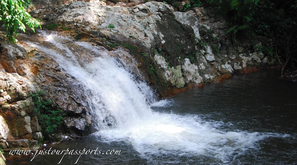 This park is in Lenggong Valley off of 76. There is a very small sign off the main road that leads you down a partially paved road that looks like someone's driveway. We did it in a small car without four-wheel drive so any car should make it. At the end of the road is a big parking lot where you can leave your vehicle for free. Walk up the paved path until you get to the waterfalls. There are more farther up but the bridge has fallen in - a little adventure through a stream never hurt anyone though! Lots of locals visit the pools on weekends so go during the week if you want a quieter experience.