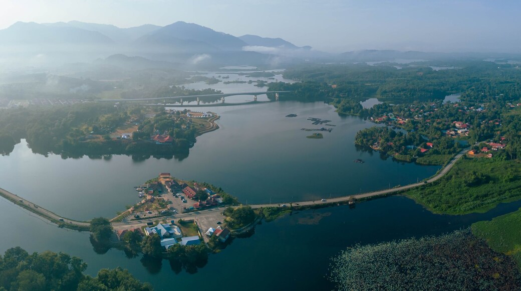 Panoramic aerial drone view of calm lake scenery at Tasik Raban or Raban Lake in Lenggong, Perak, Malaysia
