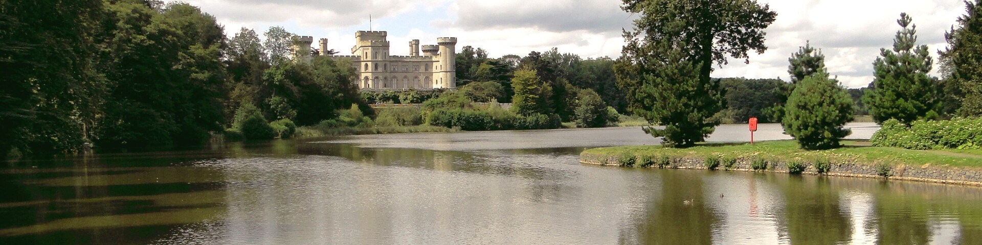 Eastnor Castle. Smirke's pile, seen from across the lake.