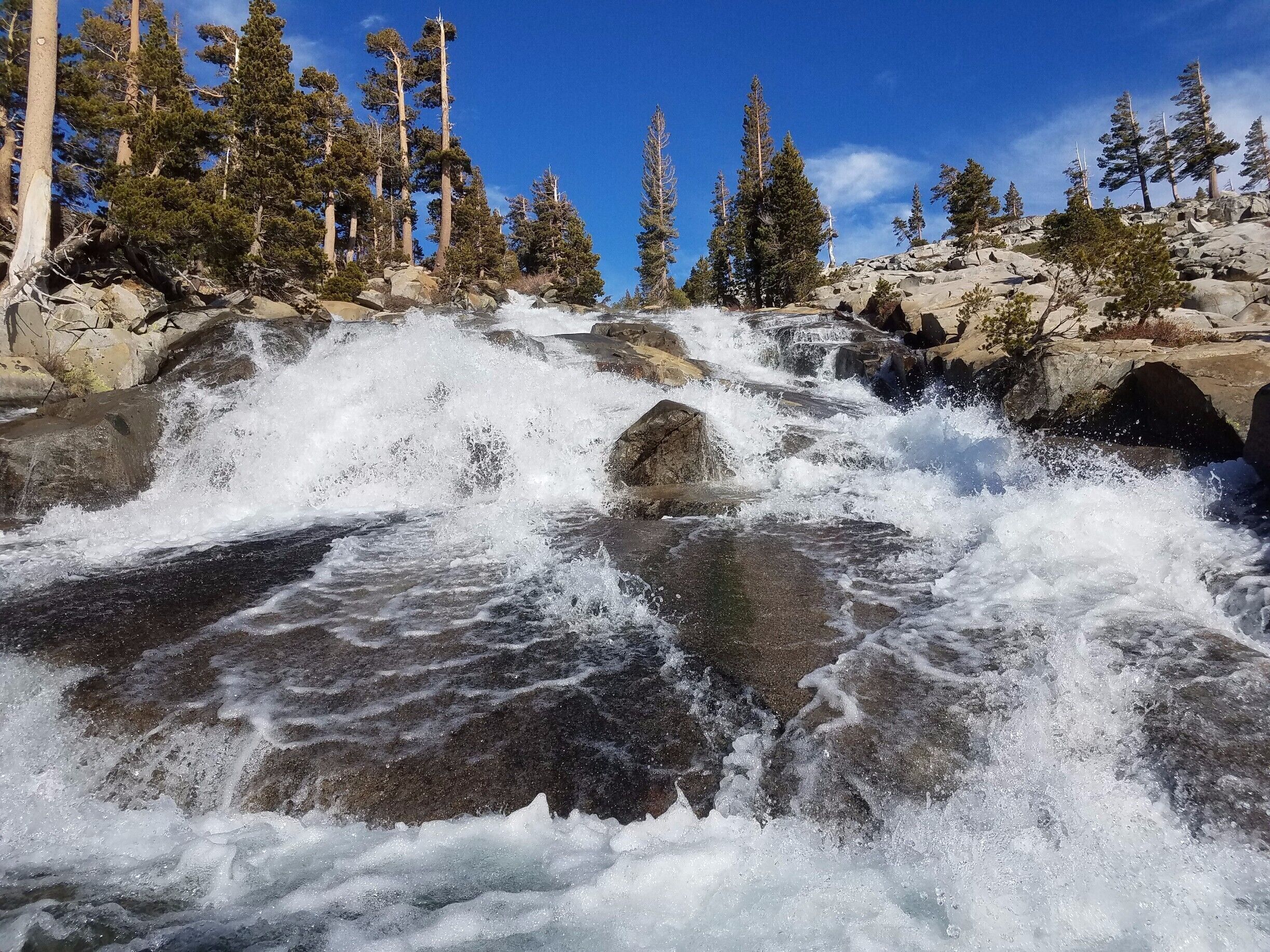 Pyramid Creek Cascades flows from Desolation Lake to Ropi lake in the Desolation Wilderness. Located South of Lake Aloha and the PCT, Shorter day route from Horsetail Falls trail off hwy 50.  Beautiful set of Cascades with great backpacking lakes on both ends.