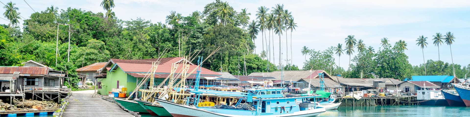 traditional fisherman's boat docked in the harbor, Labuhan cermin, Berau, Indonesia.. Labuhan Cermin is one of tourist resort in Indonesia