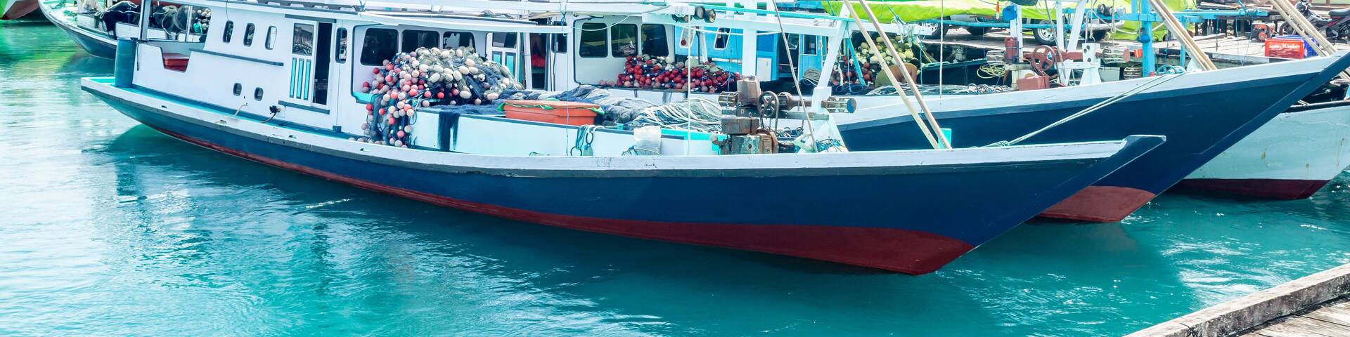 traditional fisherman's boat docked in the harbor, Labuhan cermin, Berau, Indonesia.. Labuhan Cermin is one of tourist resort in Indonesia