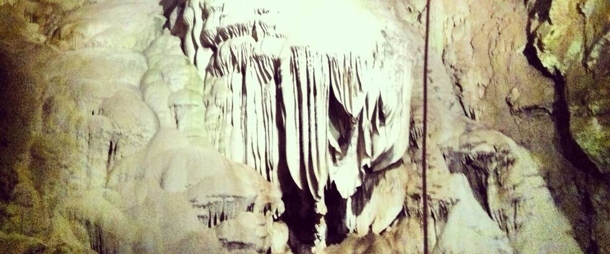 A cave with stalactites and stalagmites.