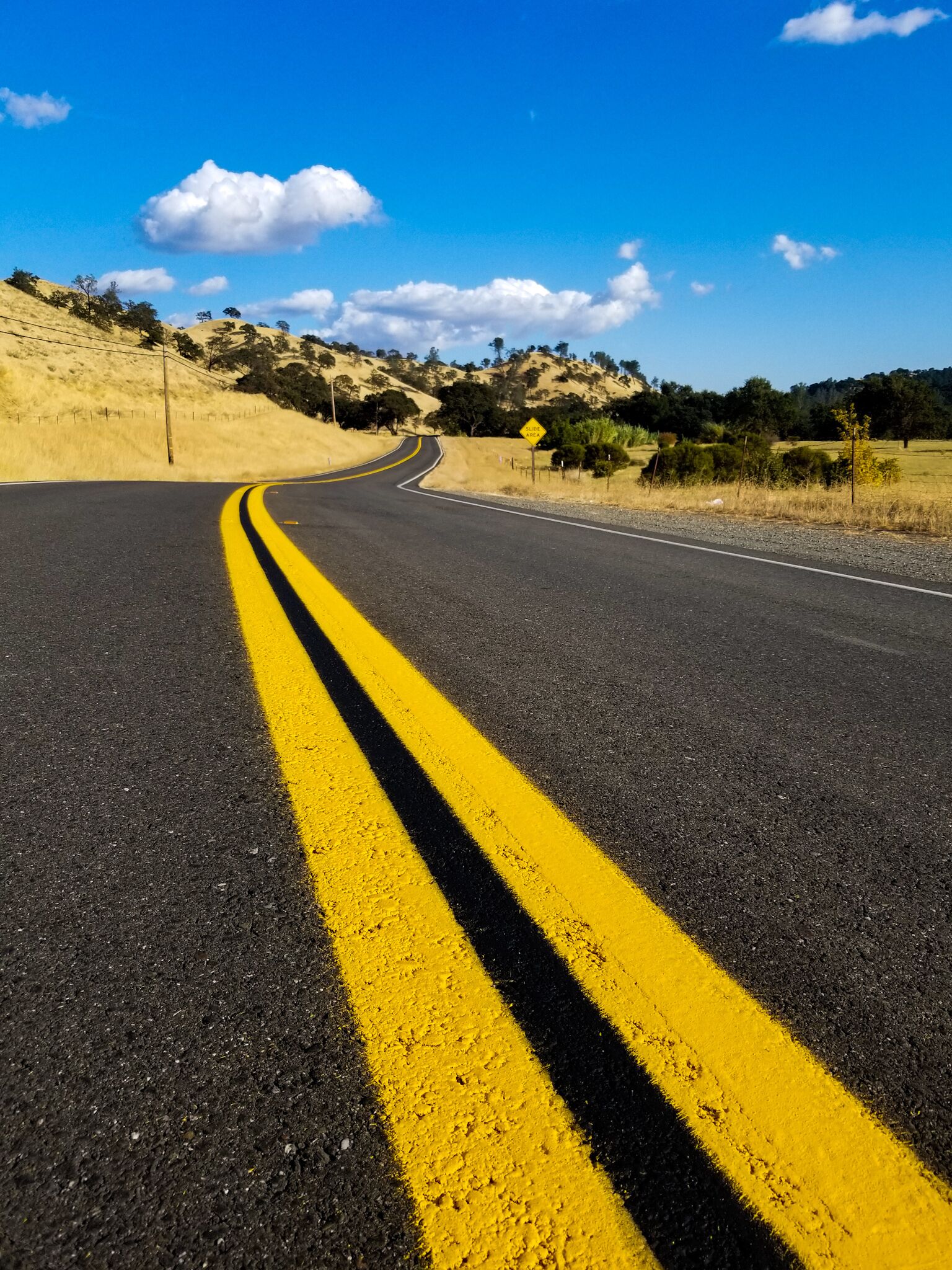 If you follow US 128 from Winters, CA to Rutherford, CA you come by Lake Berryessa and the Glory Hole but also pass through a pretty nice countryside. Hilly, green and wide open, the drive on US 128 is one of the prettiest I have done on my trip. You can also explore US 121 from which brings you directly into the beautiful Napa Valley! #LifeAtExpediaGroup #yellow