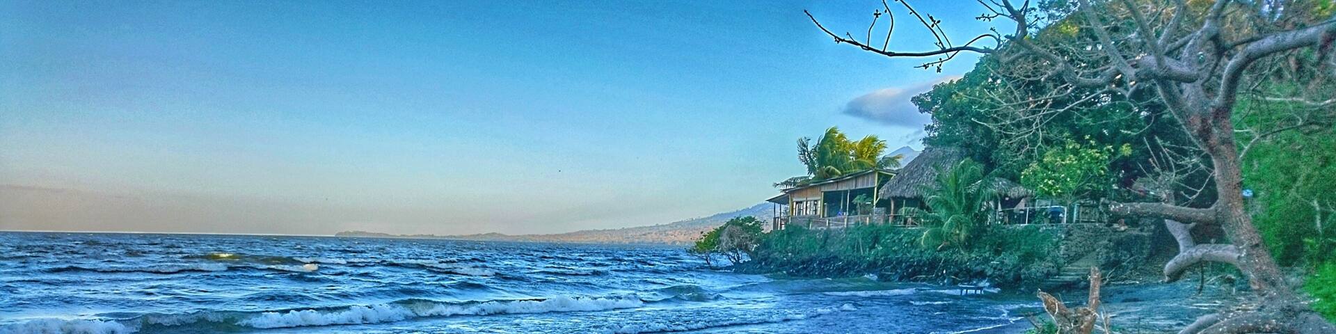 It looks and sounds just like the ocean, but Playa Santo Domingo is on Central America's largest lake. Ometepe Island is made up of two massive volcanoes, and Santo Domingo is its biggest beach. Here you'll see monkeys in the trees and horses bathing in the water. #BeachTips