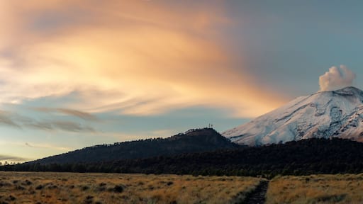 Crater fumarole among clouds of popocatepetl volcano in Mexico, panoramic view