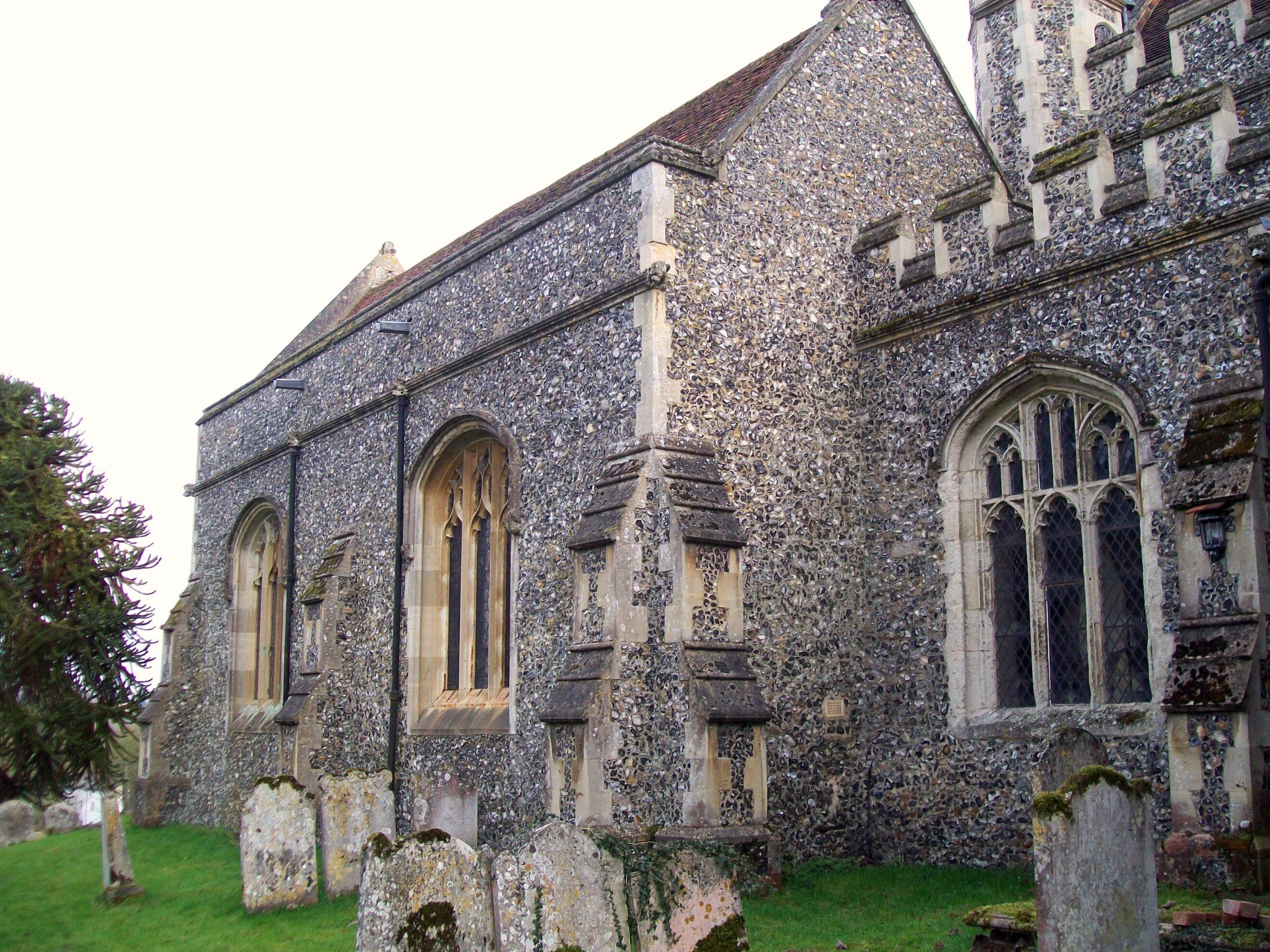 A historic church with Gothic architecture, featuring pointed arches and stained glass windows.