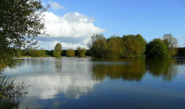 Fishing pond reflections 1 Pond is south of the A518 between Newport and Gnosall.