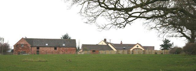Ivy Farm House Old farm buildings converted into dwellings including an indoor swimming pool at the rear, which the public footpath is adjacent to.