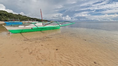 Balangay or bangka boats ashore. Punta Ballo beach-Sipalay-Philippines. 0293